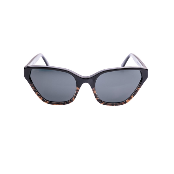 This handmade designer cat eye shaped eyewear is made using premium italian high gloss acetate, with leopard print acetate detail on the lower half of the face frame that rests on the cheek.  The lenses are a smokey gray solid tint.